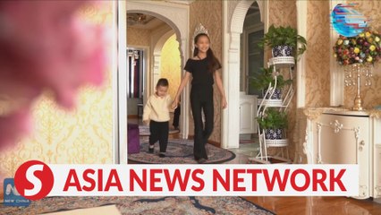 Happy time for Xinjiang shopkeeper Masahan Mijit