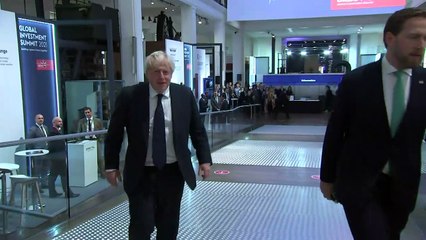Boris Johnson tries out green gadgets at investment summit