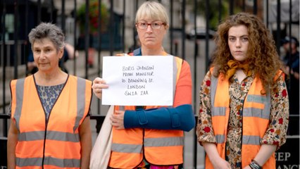 Exasperated mother runs into Insulate Britain protests with her Range Rover