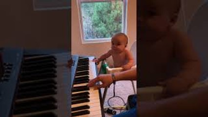 Baby Gus Grooves to Piano Playing