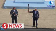 Greece hands over Olympic flame to Beijing 2022 organisers