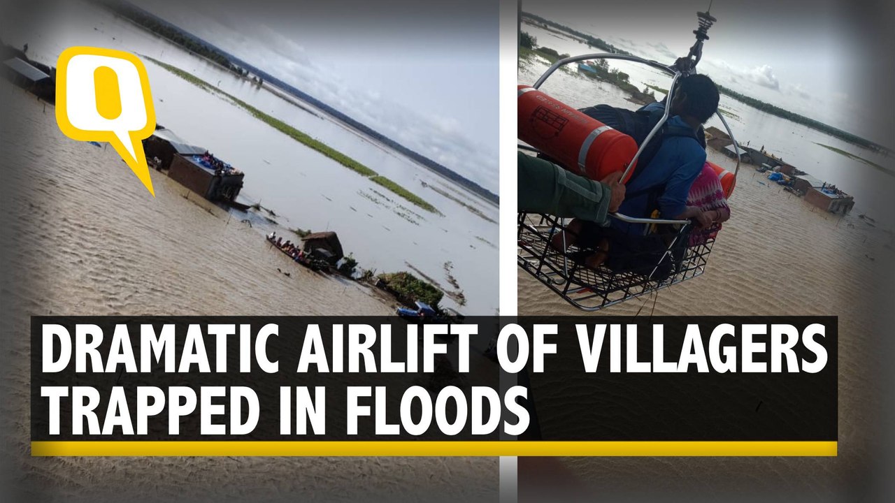 Watch: Air Force Airlift Villagers Trapped in F...
