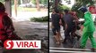 Fireman almost drowns during flood rescue operation in Melaka