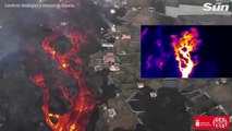 Aerial vid shows rivers of lava flowing across La Palma engulfing buildings