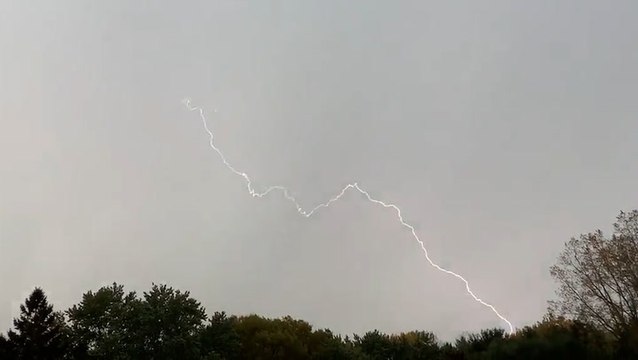 Thunderstorms roll from the Northwest into the Plains