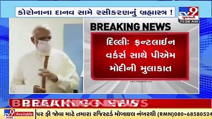 Delhi_PM Modi interacts with health workers at RML Hospital as India crosses 100 cr vaccination mark