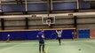 Man Shows Trick By Throwing Ball Through a Hoop While Hula Hooping Multiple Rings