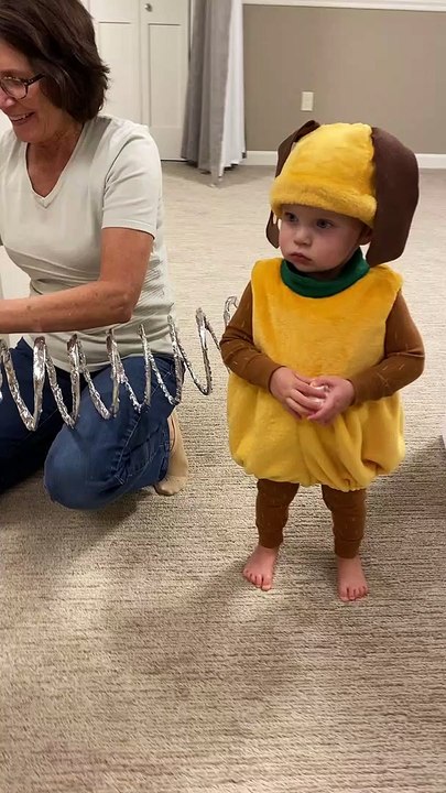 Twin Toddlers Dress Up as Slinky Dog for Halloween