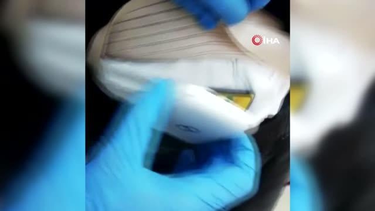 Son dakika: Ehliyet sınavında kopya girişimi: Düğme görünümlü kamerave kablosuz kulaklık ile yakalandı