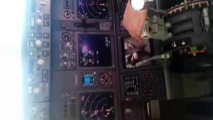 Oncoming Aircraft Passes Beneath Plane