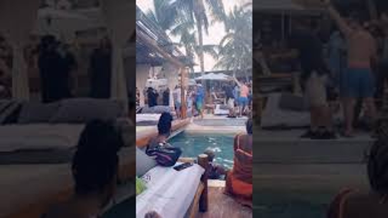 Guy Missteps and Smacks Face on Cabana Pole