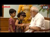 On Raksha Bandhan, Women & Children Tie Rakhi To PM Modi's Wrist