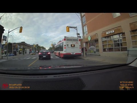 Driver Swerves into Oncoming Traffic to Pass Bus