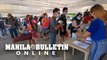Local and foreign visitors arrive at Balatero Port as Puerto Galera opens
