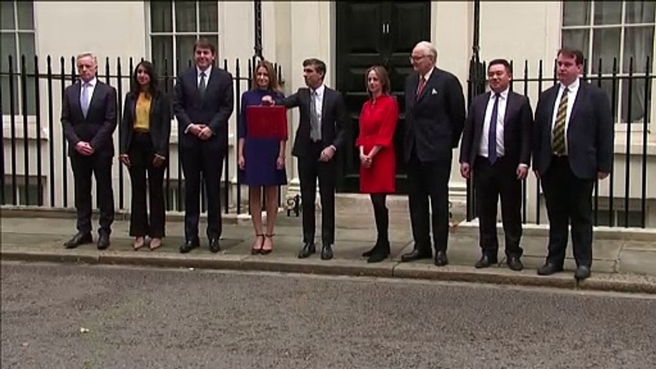 Chancellor Rishi Sunak poses with ministerial Red Box ahead of Budget speech