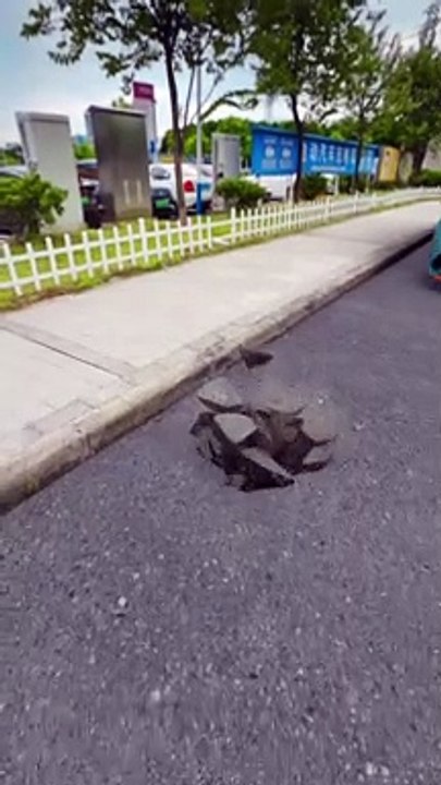 The road collapsed, but fortunately I stopped the car and escaped