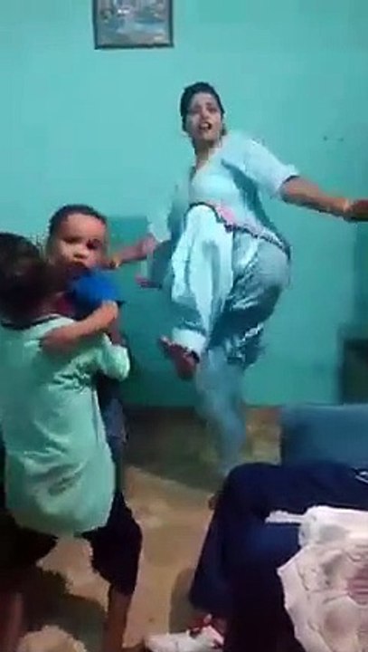 Desi mom dancing with her kids.