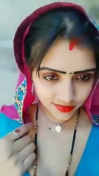 Pretty girl making short video on road