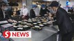 Central kitchens in China ensure food supply amid Covid-19 pandemic
