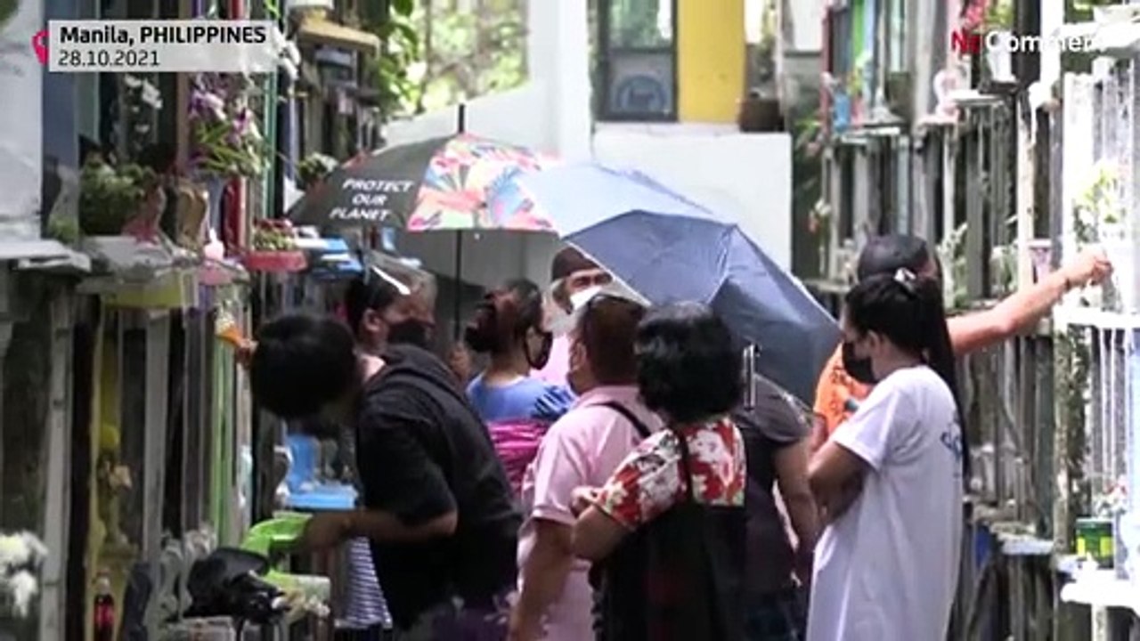 Les Philippins affluent dans les cimetières avant une Toussaint sans cérémonies