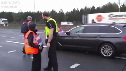 Insulate Britain protesters change tactics by walking into oncoming M25 traffic