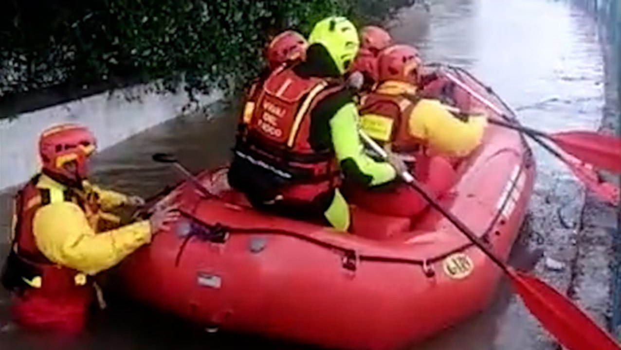 Man and dog rescued from Sicily flooding