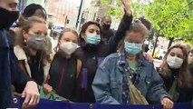 Greta Thunberg runs from press at climate protest in London