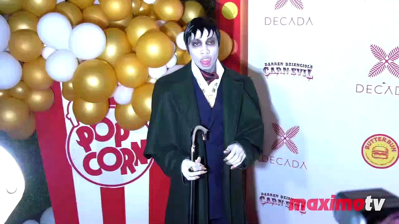 Tyga "Darren Dzienciol's CARN*EVIL Halloween Party" Red Carpet