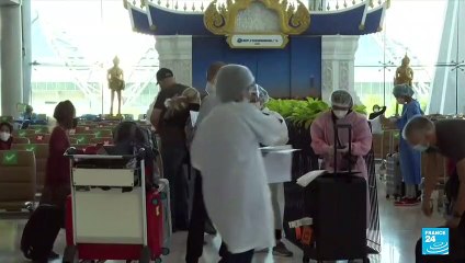 Hopes high as tourists touch down for Thailand re-opening