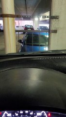 Darkness of Parking Garage Hides Spooky Surprise in Car