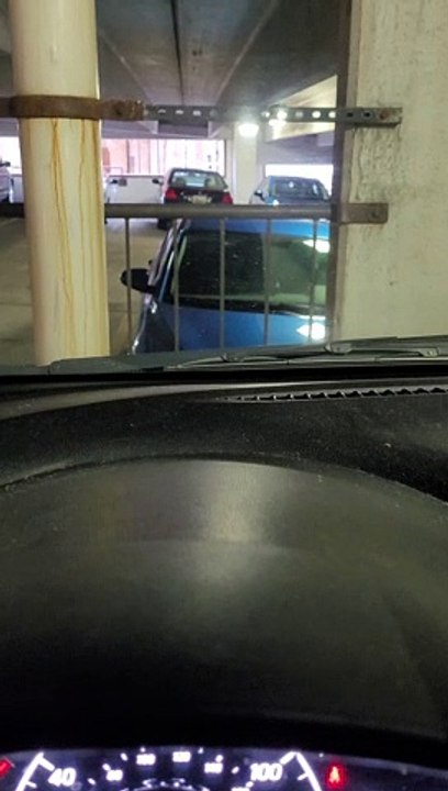 Darkness of Parking Garage Hides Spooky Surprise in Car