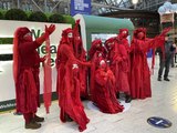 Red Rebels in Glasgow Central Station