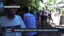 Banjir Surut, Petugas Bantu Warga Bersihkan Rumah