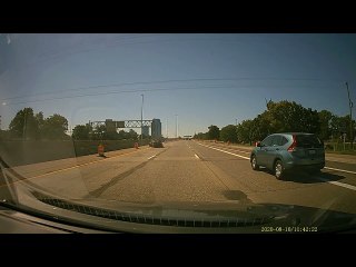 Car Slides Into Center Barrier at High Speed