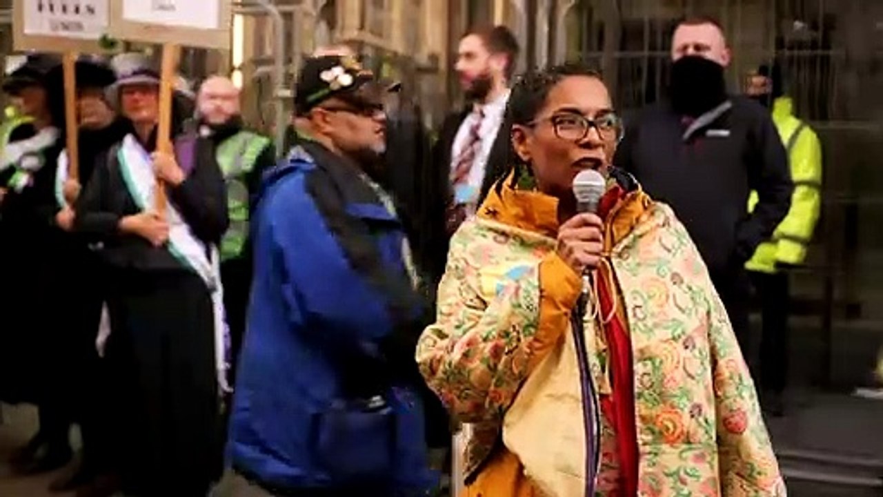 Extinction Rebellion activists protest outside JP Morgan in Glasgow