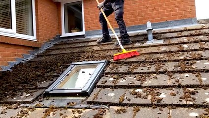 How 28 years of moss is deep cleaned from a roof