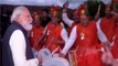 PM plays drums with members of Indian community in Glasgow