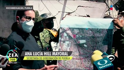 Habitantes de Xochimehuacán, Puebla, rescatan pertenencias tras explosión