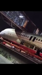 Air India plane stacked in skywalk Bridge