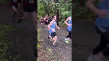 Athlete Dives Into Mud Puddle During Race