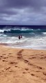 Strong Wave Slams Unprepared Swimmer Into the Sand