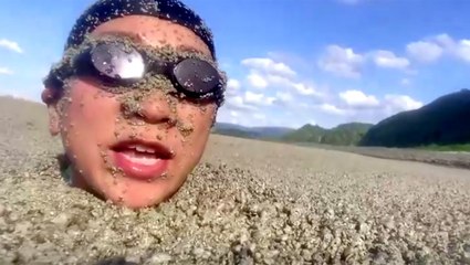 VIDEO: Japan's southern beaches are covered in pumice after an underwater volcanic explosion