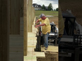 Cutting a 9 Foot Tall Deck Using a Skid Steer