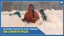 Devotees take dip in toxic Yamuna on Chhath Puja