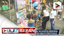 Mga magulang, pinaalalahanan ng eksperto na 'wag munang palabasin ang mga anak; Pamunuan ng Quezon Memorial Circle, tiniyak na nasusunod ng mga bisita sa pasyalan ang health protocols