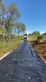 Dump Truck Back Spreading Gravel