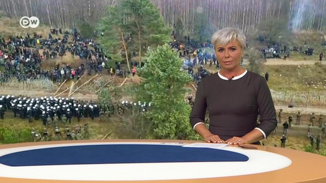 Лукашенко гонит мигрантов в ЕС: страшные кадры с польской границы. DW Новости (09.11.2021)