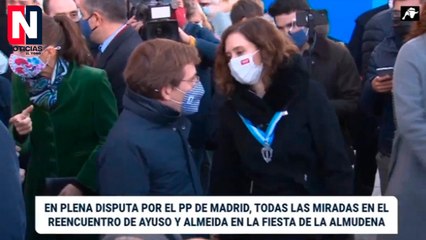 Ayuso y Almeida se encuentran en La Almudena en medio de la batalla por el PP de Madrid