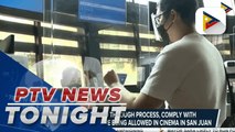 Moviegoers go through process, comply with requirements before being allowed in cinema in San Juan