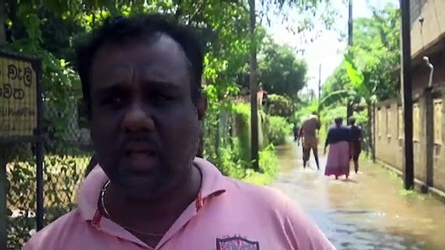 Sri Lanka still in knee-deep floodwaters after heavy rain left 25 dead